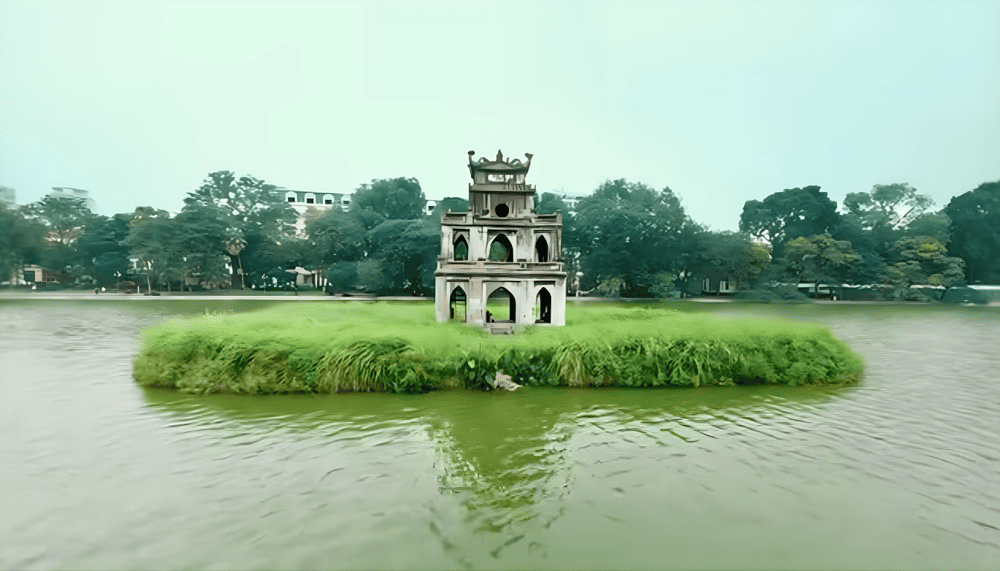 Turtle Tower is a small tower located on an island mound in the middle of Hoan Kiem Lake, built between mid-1884 to April 1886 and influenced by French architecture (Source: Fanpage Đền Ngọc Sơn và khu vực hồ Hoàn Kiếm)